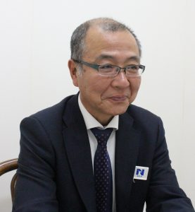 受賞の喜びを語る奥村嘉章巡査部長。柔和な笑顔からは想像できない熱い心を持っている